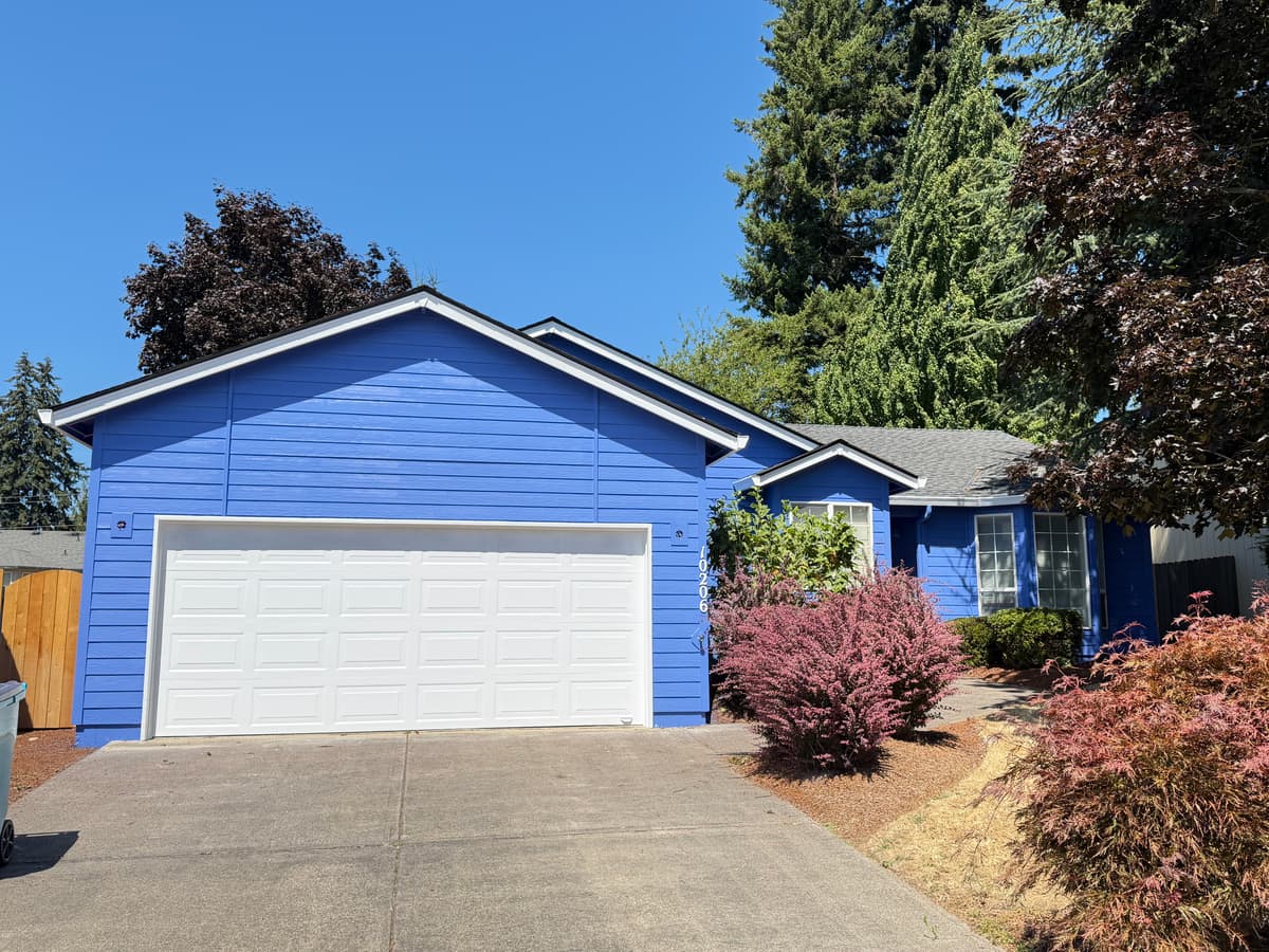 Blue repainted house, front elevation and garage, by Handy Brothers LLC